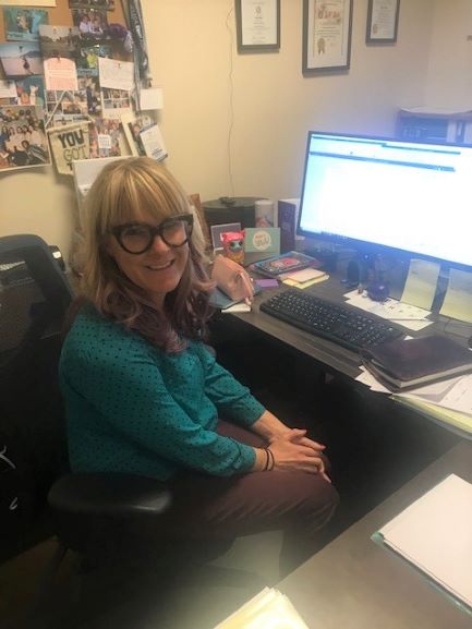 Executive Director Kate Marr at desk